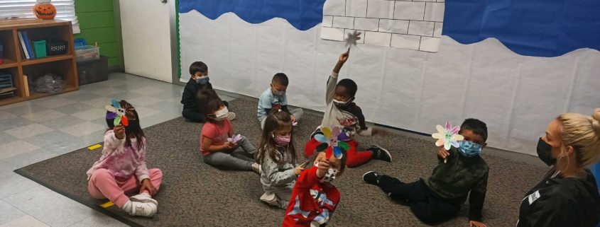 Children learning and participating in class